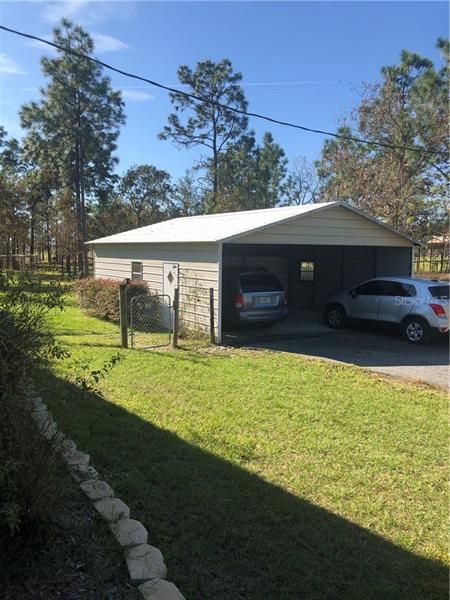 2 Car Carport with storage nearest home