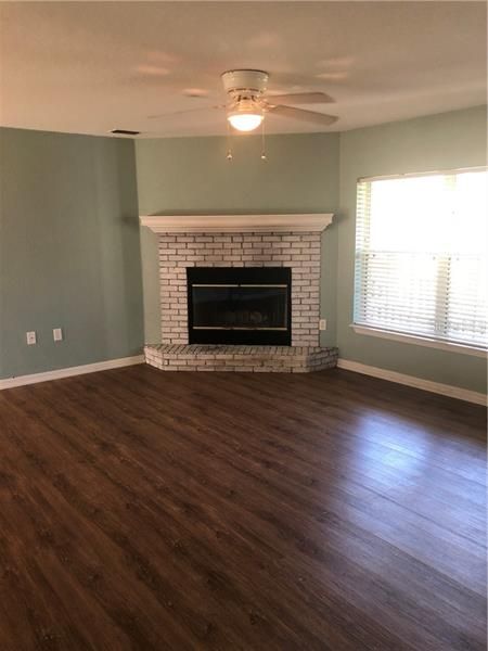 Living Room-wood burning fireplace