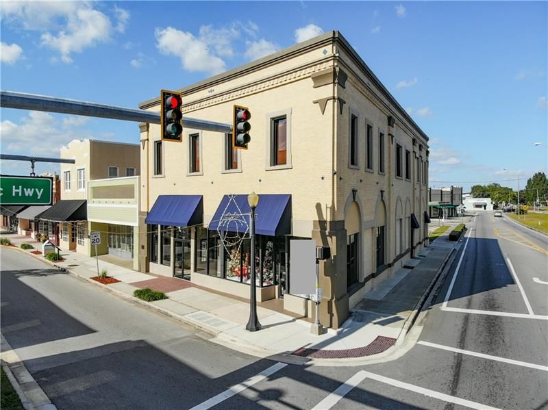 Totally renovated Multi-Tenant Office/Retail building with large adjacent parking lot and high quality finishes.