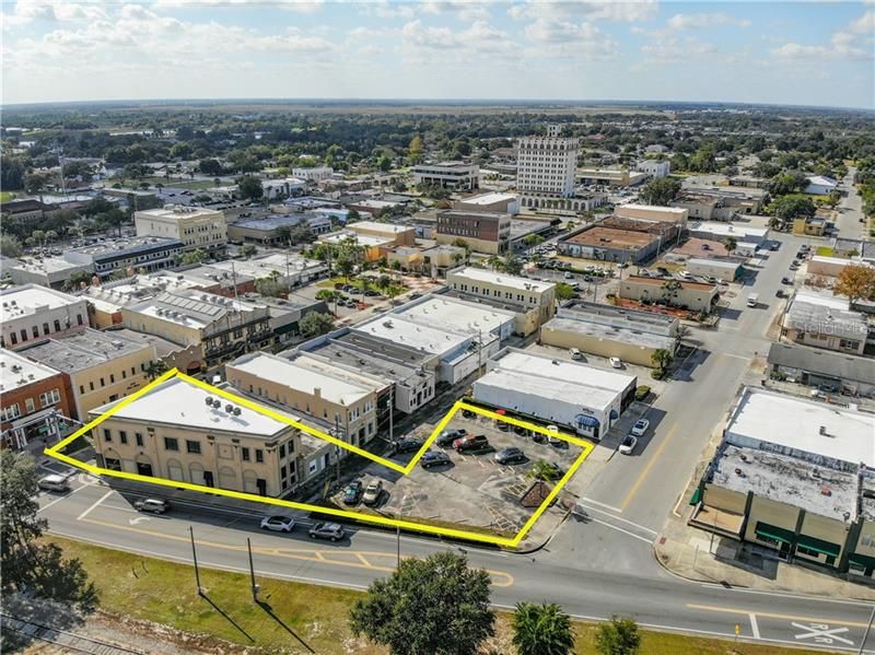 Aerial view of downtown Lake Wales with the property outlined.