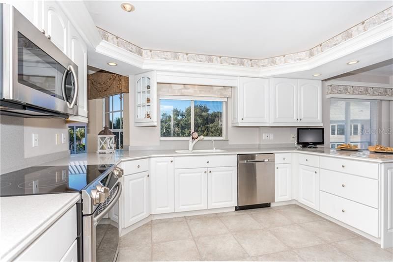 Spacious kitchen accented with crown molding