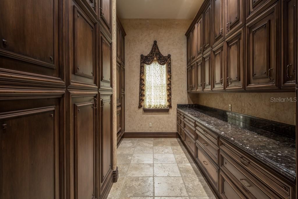 To accommodate the estate which comfortably sleeps sixteen guests, the kitchen offers a large walk-in pantry with two additional refrigerators, catering counter and endless storage.