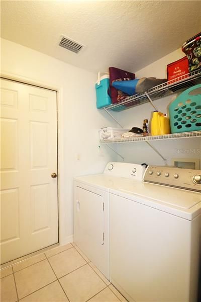 INSIDE LAUNDRY, WASHER AND DRYER CONVEY