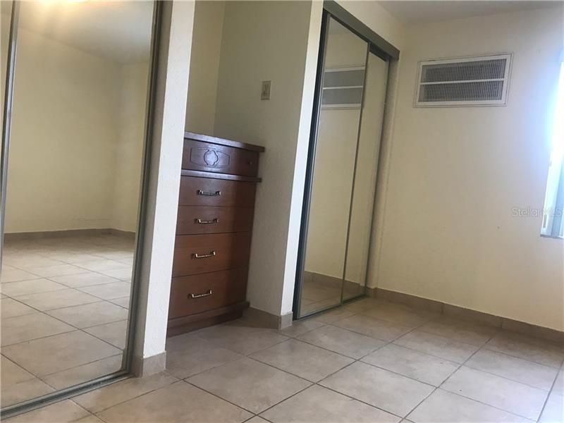 Master bedroom has a his and hers closet.