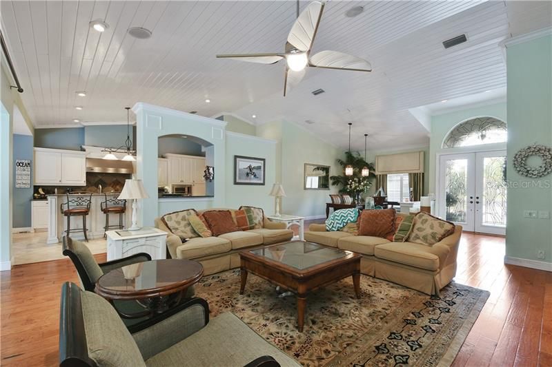 Great Room: Vaulted wood Ceilings, 7.1 surround sound, Real Cherry wood floors, high end light fixtures