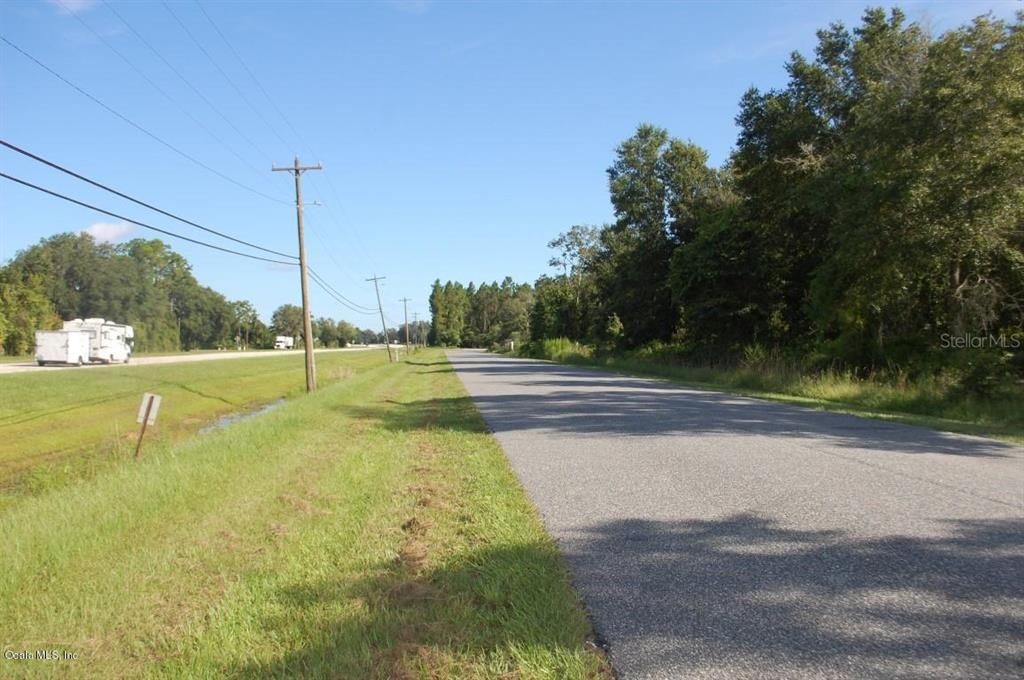 View of frontage road and property