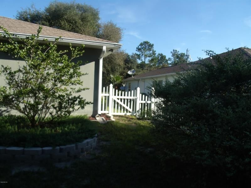 FENCED BACK YARD