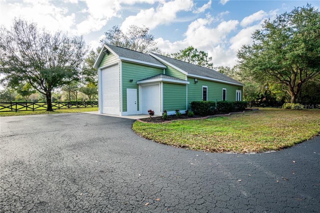 RV height door, insulated workshop could convert to Barn Apartment