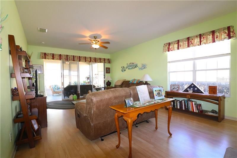 SPACIOUS GREAT ROOM WITH LAMINATE FLOORING