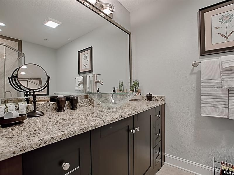 Master Bathroom 2 features upgraded fixtures and granite countertops as well!
