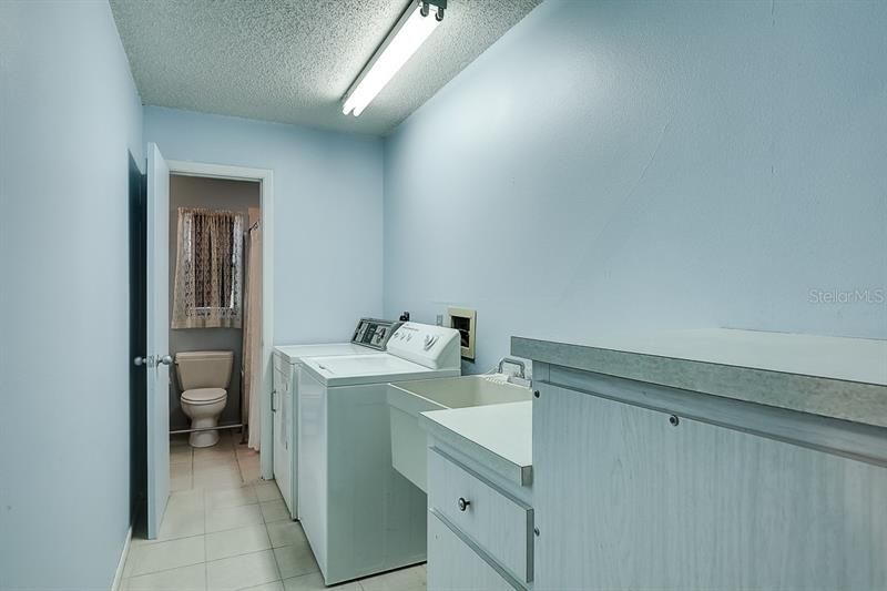 Laundry room with pass through to master bathroom