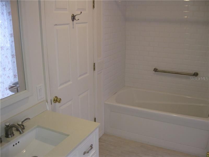 Master Bath with tub/shower combo is just off 1st. flr. master bedroom.