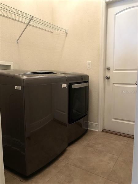 Laundry room with NEW washer and dryer!