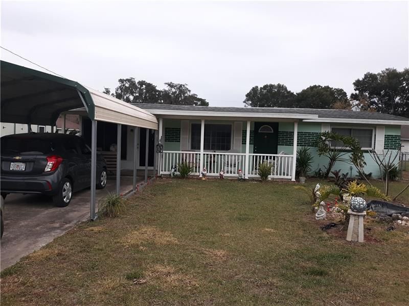 Front view with carport