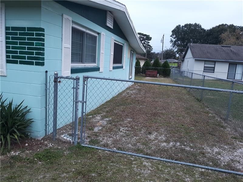 Fenced in side yard.  You can pull in an RV or boat right here in this fenced in side yard!  Done just right!