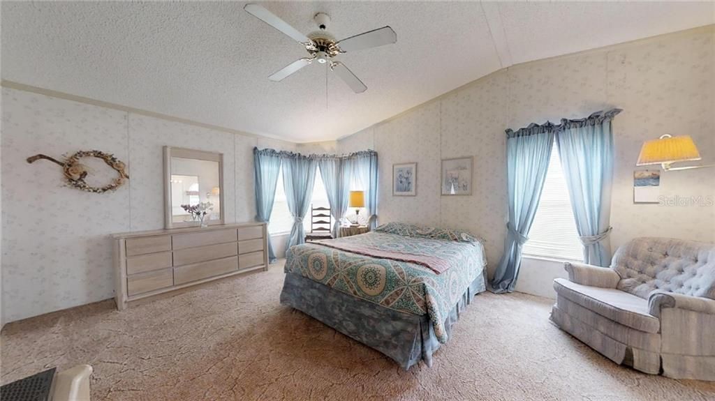 Immense Master Bedroom with Vaulted Ceiling.