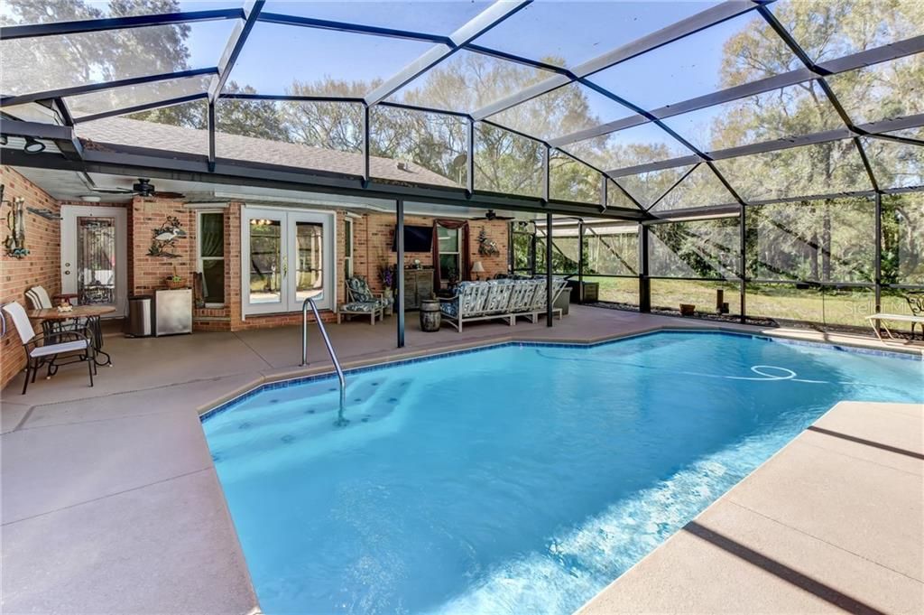 Screened pool and covered sitting area