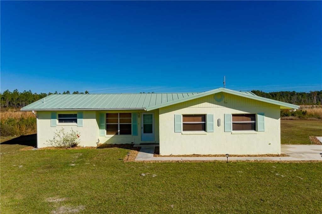 Front exterior.  Metal roof was replaced 3 years ago.