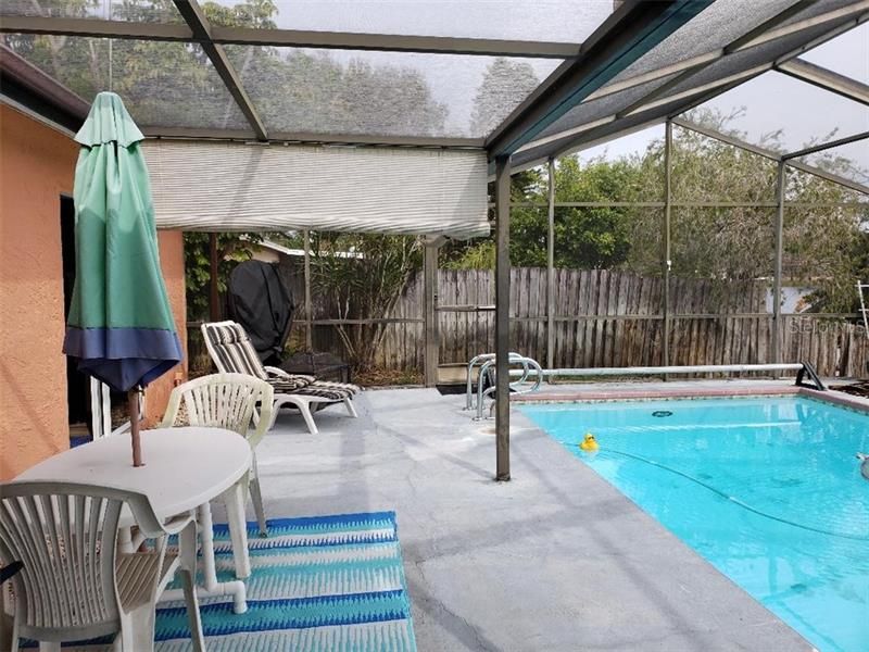 The screened covered lanai area so you can still get some sun sitting around the pool but protected from mosquitos