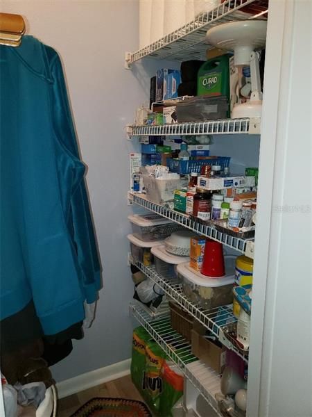 Happ pantry and coat closet conveniently located by the front foyer nad kitchen