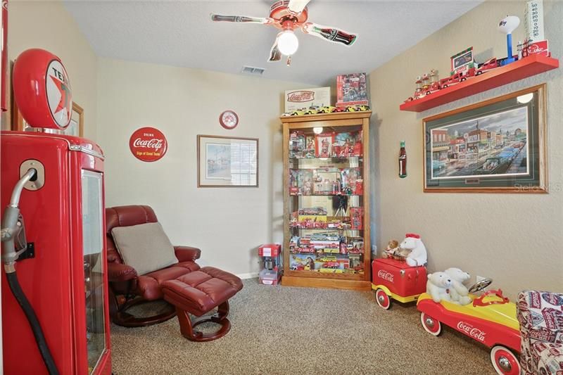 Den/man-cave but can be used as an office or playroom.