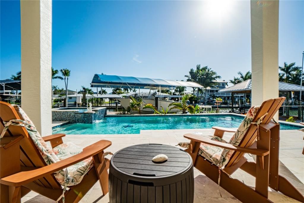 Florida living is easy living! Your open air resort style pool on the ground level.