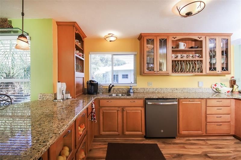 Kitchen updated with wood cabinetry, granite & stainless appliances