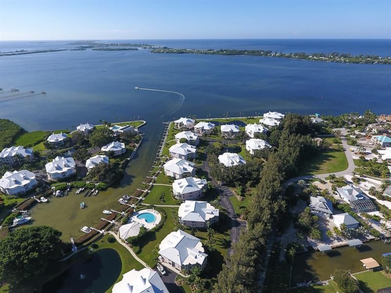 Premier resort style waterfront community perfectly positioned 1.5 miles from Boca Grande with its own marina & overlooking the Intracoastal
