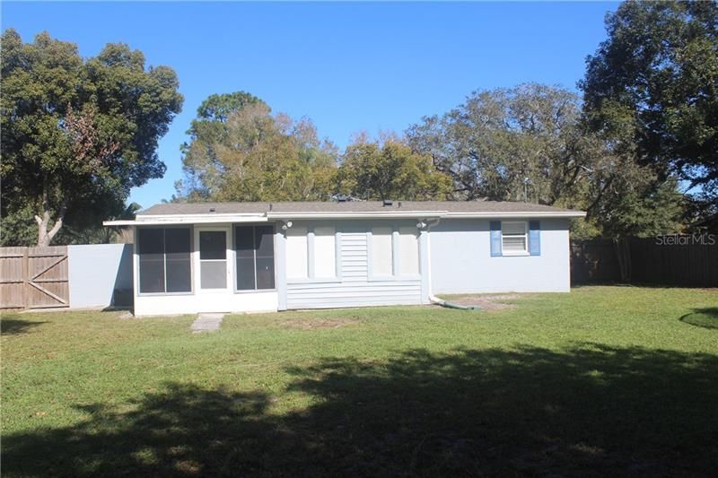 View of Back of Home.  Screened Porch has Vinyl Windows and A/C.