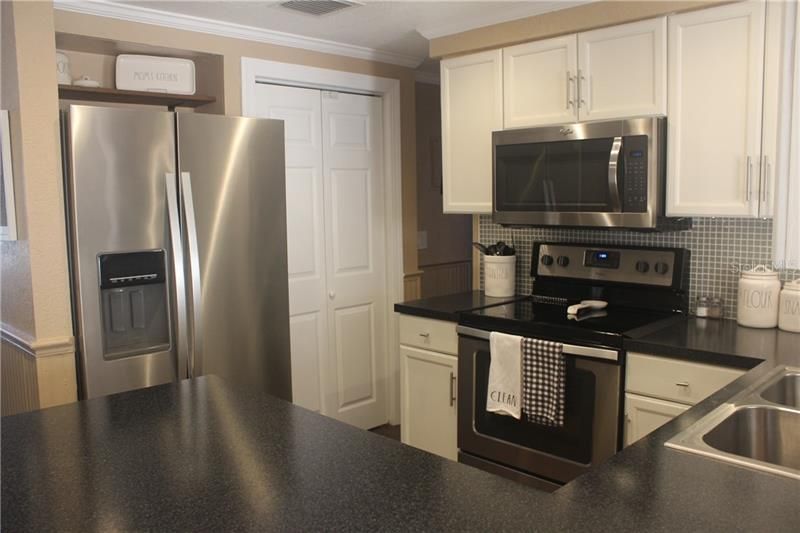 Closet Pantry, Shelving Over Fridge, Plenty of Space for Prepping and Cooking