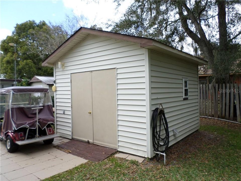 12'x12' Storage shed with full size washer/dryer