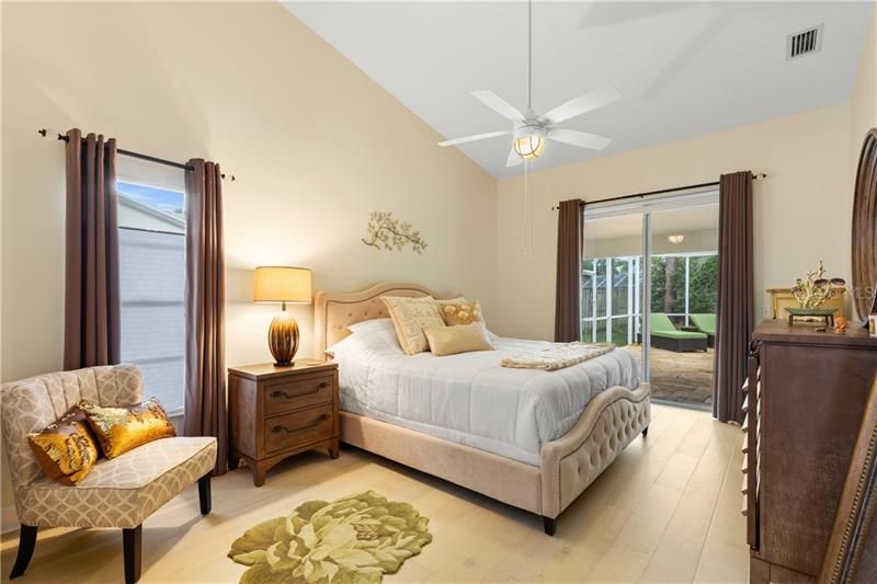 spacious master bedroom with pool access