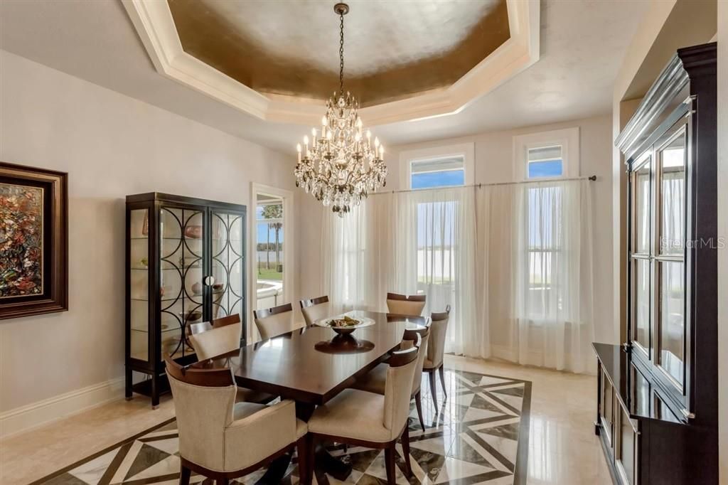 Formal Dining Room - French doors leading to lakefront Veranda