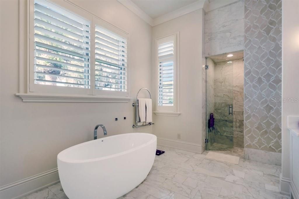 Master Bath:  Exquisite wall covering, custom shutters - Walk-in marble shower!