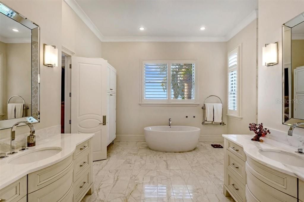 Master Bath: Marble flooring, twin vanities - walk-in shower & soaking tub