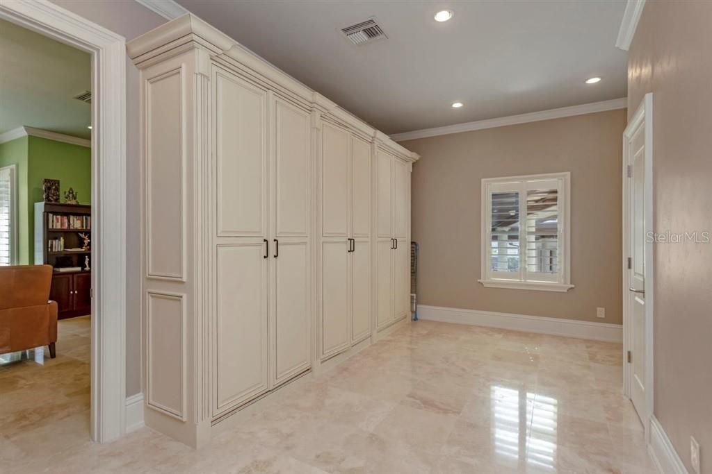 Private alcove entry into 1st Floor Bedroom Suite # 2 with full bath, twin closets (now used as a home office)