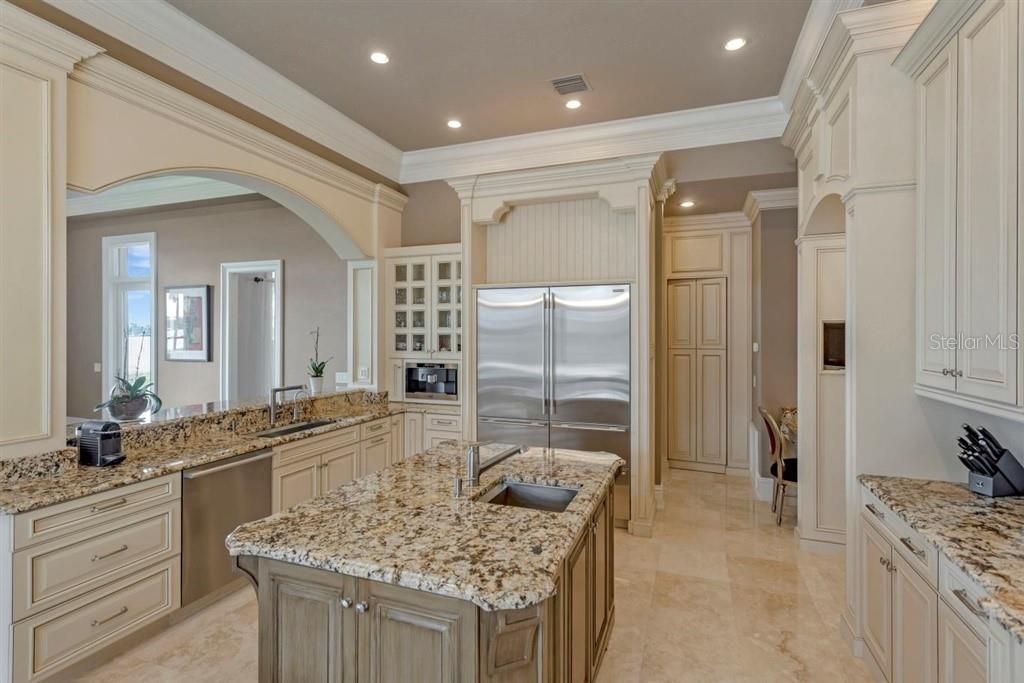 Fine Cabinetry, high quality finishes & equipment- marble flooring, granite counters