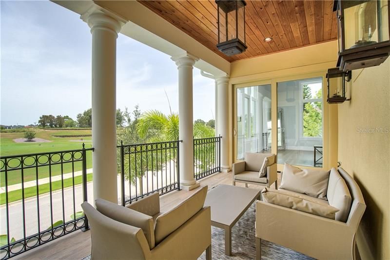 Balcony Overlooking the Golf Course Flanked by The Great Room and Office Nook