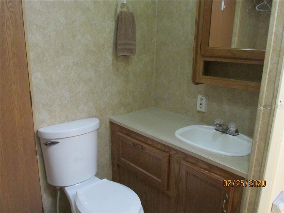 Bathroom has a shower stall, and a new regular flush toilet (not an RV style!).