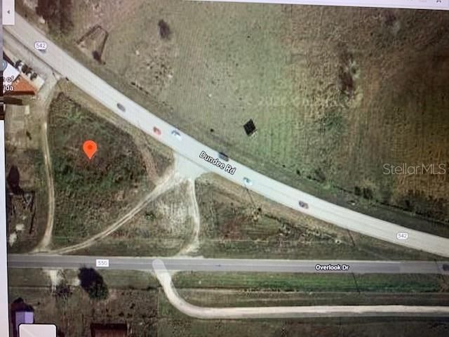 Overhead Google Earth view with Dundee Rd (542) and Overlook Dr (State Rd 550)….