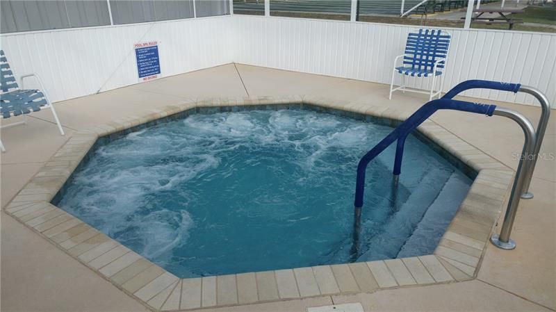 Hot tub in screened enclosure