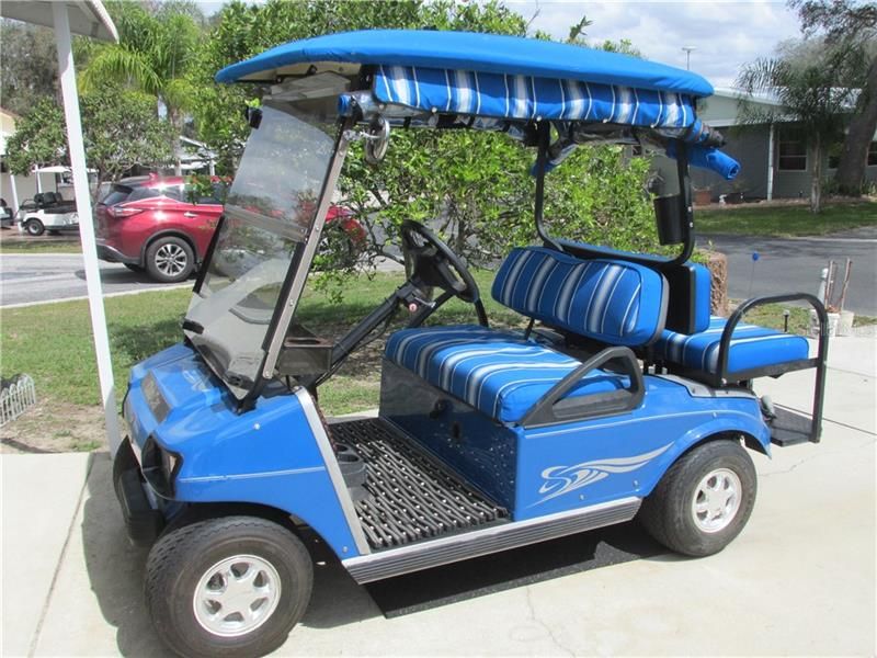 Beautiful electric golf cart included!