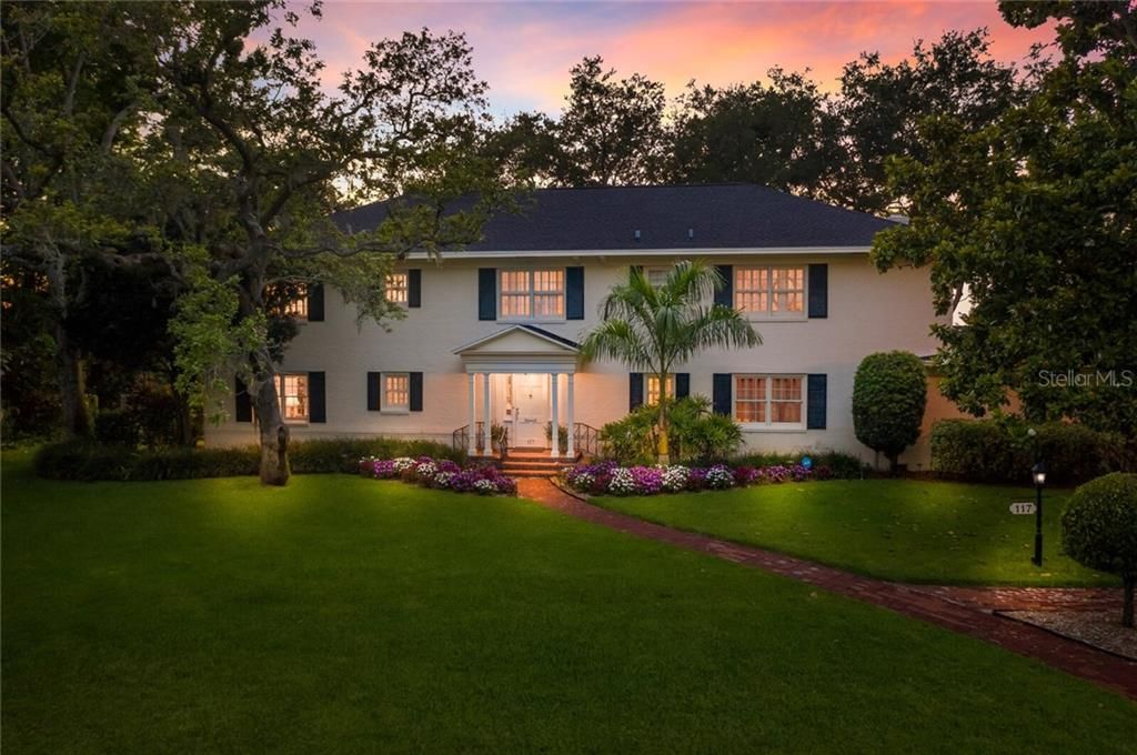 Breathtaking evening view of this classic home. 117 N 18th St W