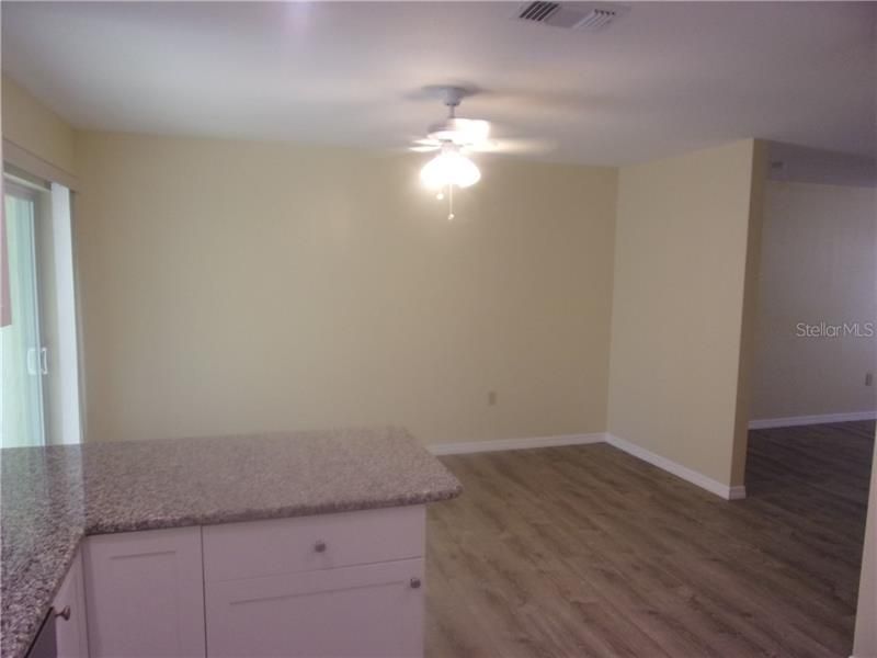 FORMAL DINING ROOM AREA  AND COUNTER TOP BREAKFAST AREA