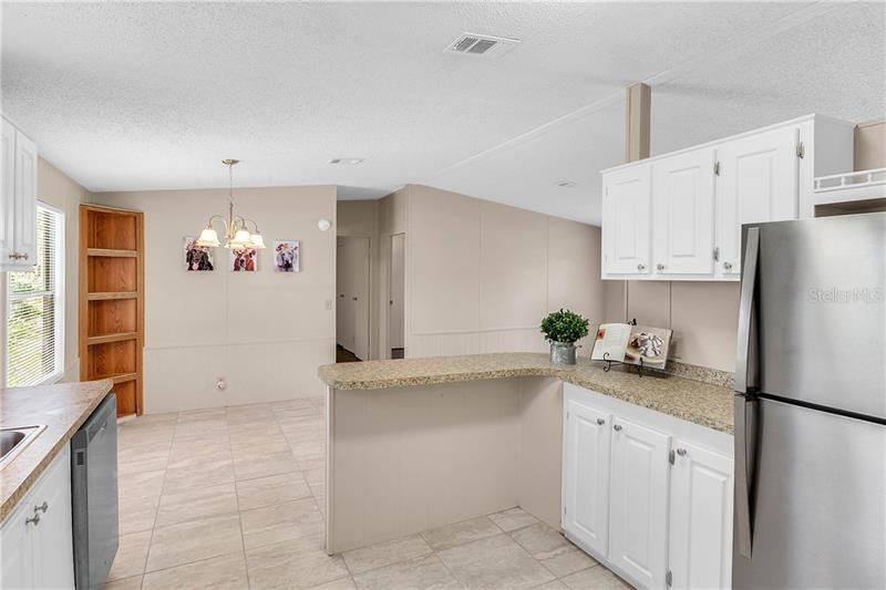 BREAKFAST BAR AND NEW TILE FLOORING