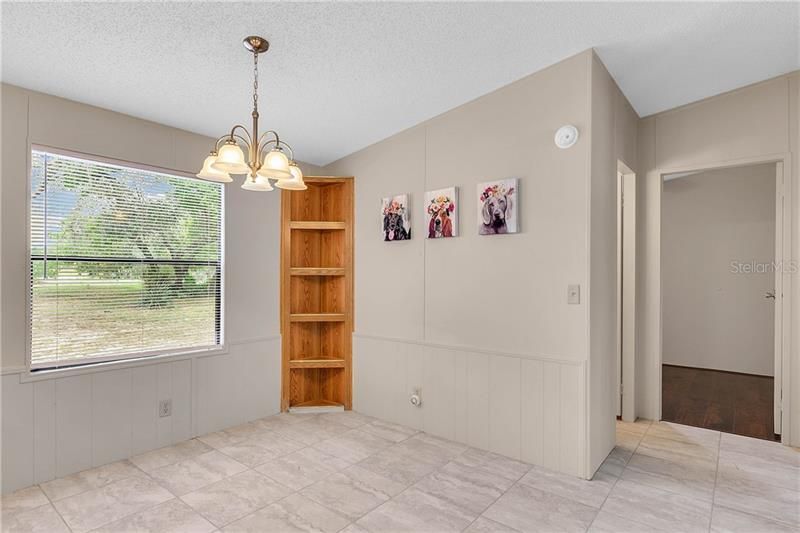 BREAKFAST NOOK IS PAINTED IN A NEUTRAL DECOR