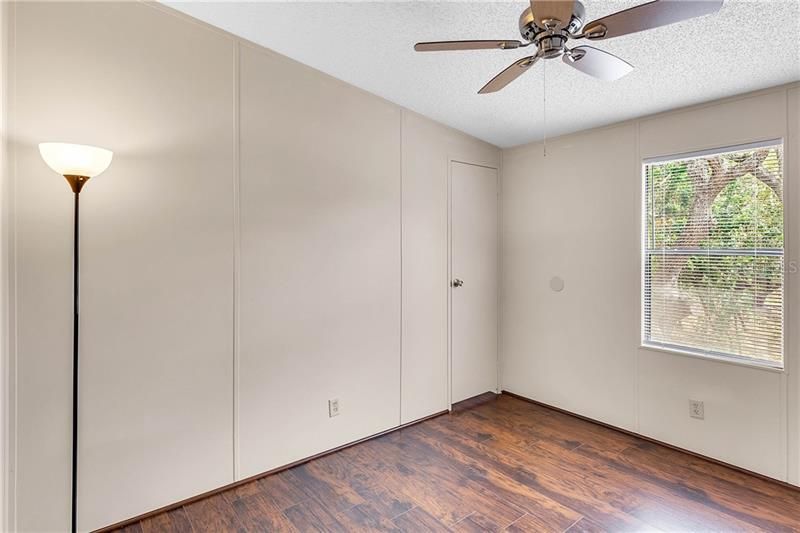 BEDROOM #3 WITH NEW CEILING FAN & A WALK IN CLOSET