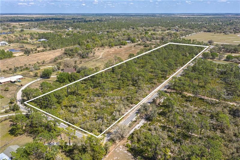 Private road runs along southern and western edge of property.