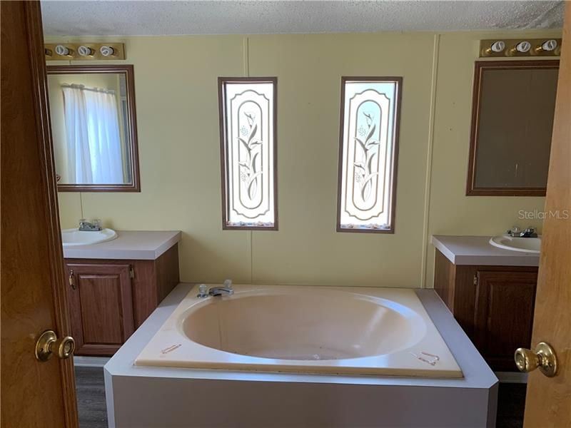 Master bath with 2 vanities, garden tub and shower!