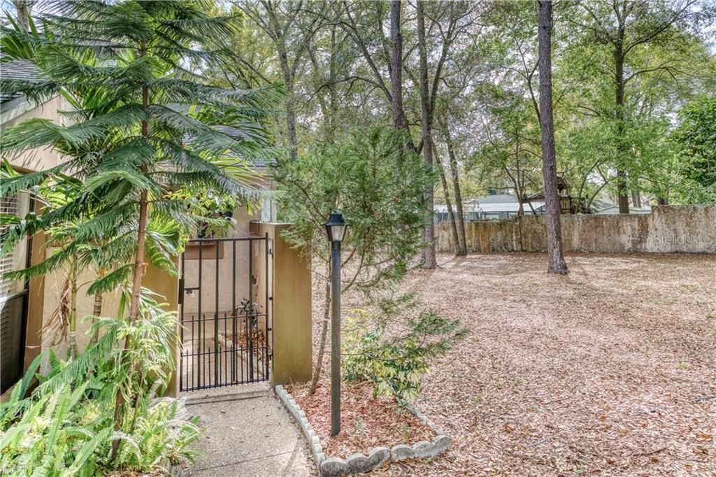 Welcome Home! This end unit offers plenty of privacy and natural beauty.